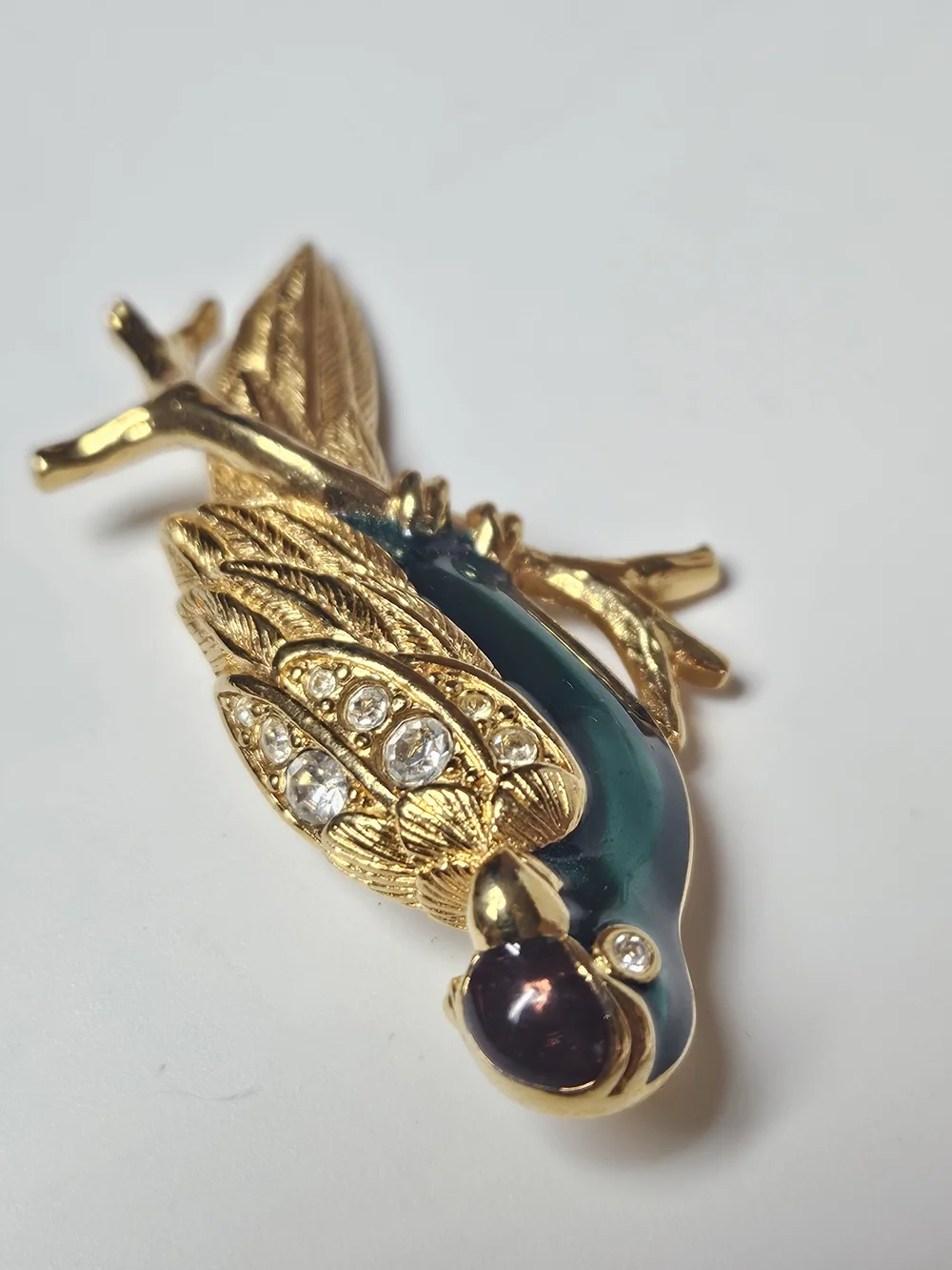 Avon Gold-Tone Parrot Brooch with Iridescent Teal Enamel and Crystals
